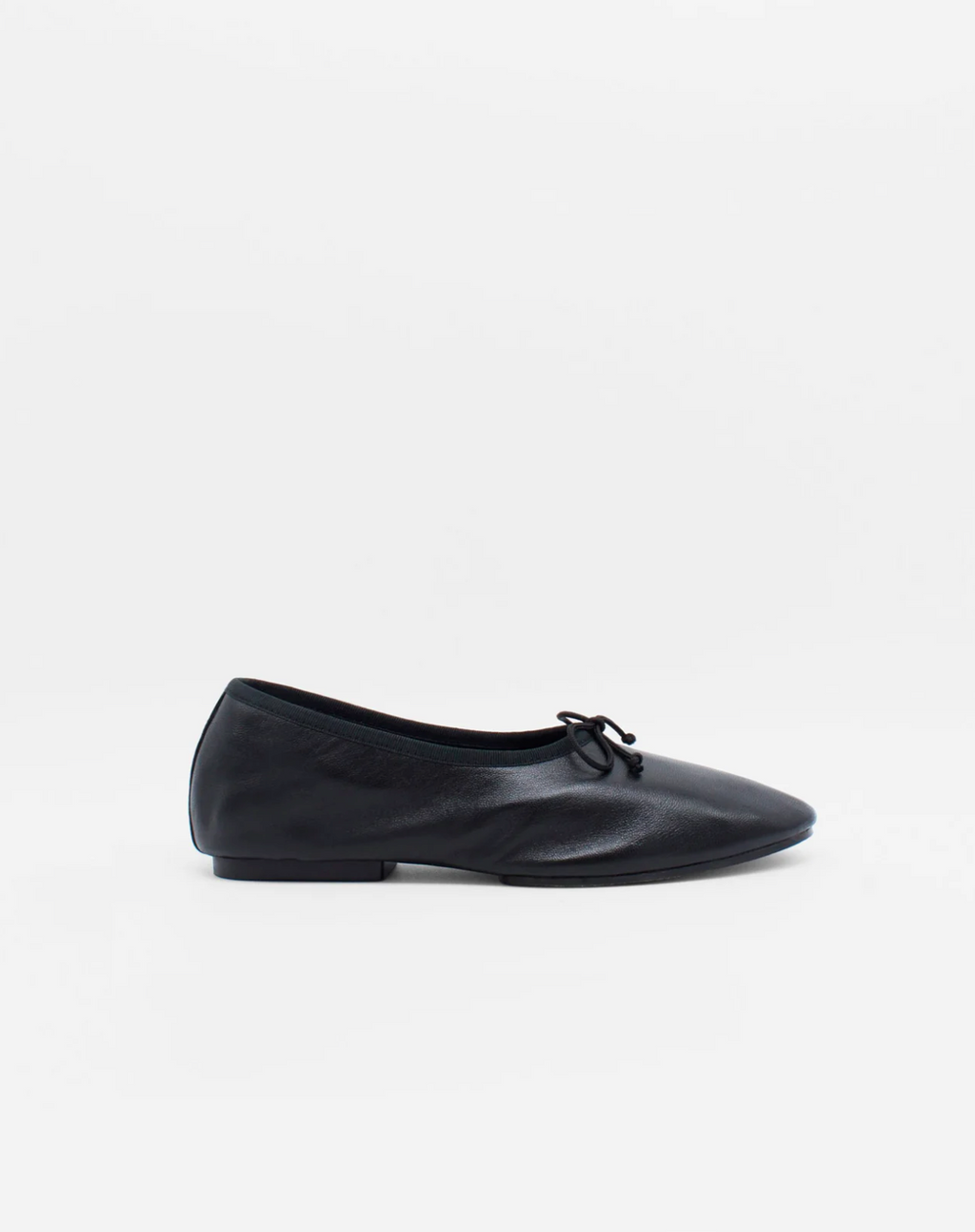 About Arianne Mila Black ballet flat side profile