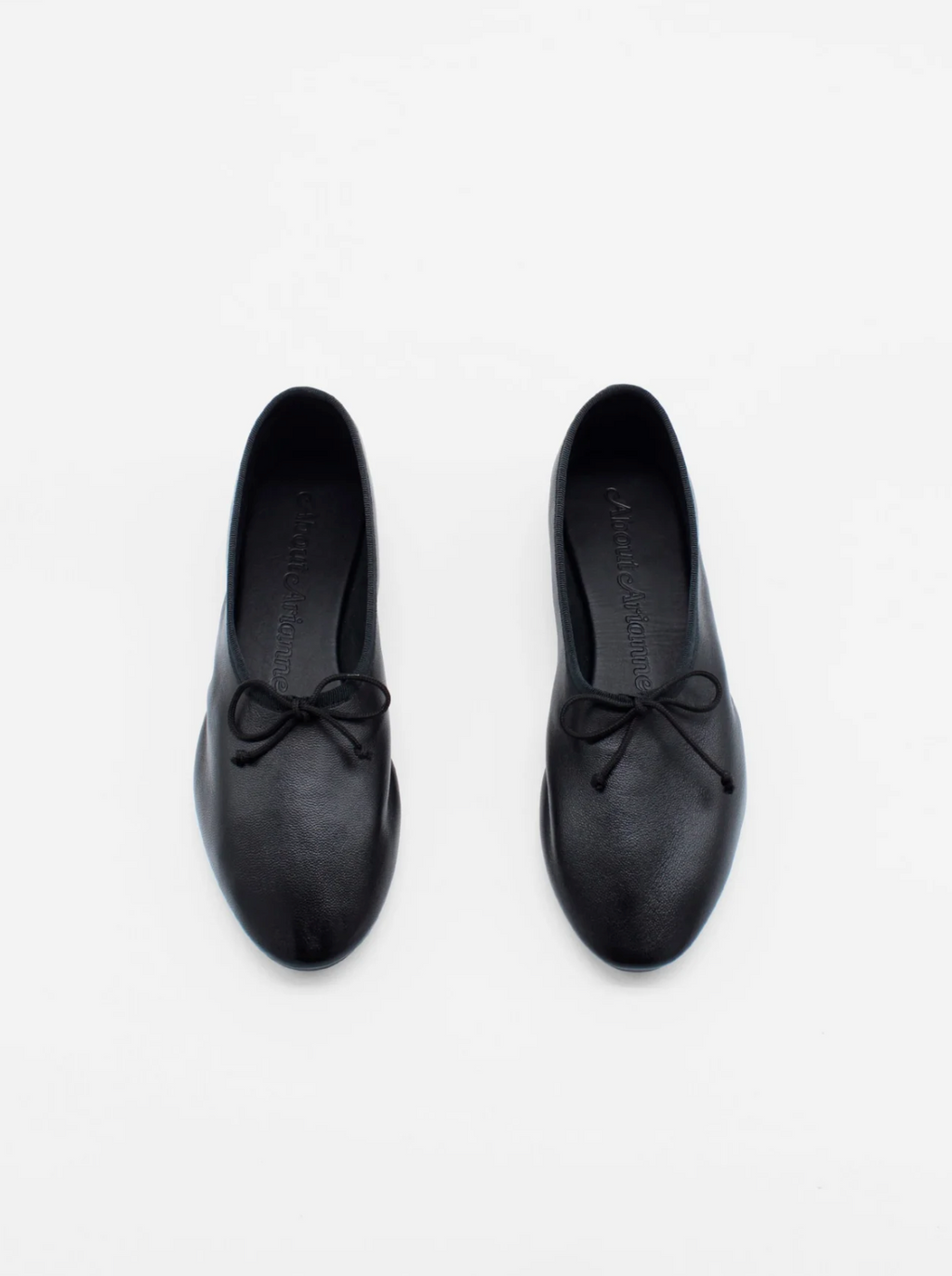About Arianne Mila Black ballet flats top view